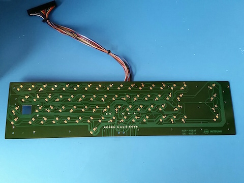 The printed circuit board of the keyboard. Contacts are gold-plated